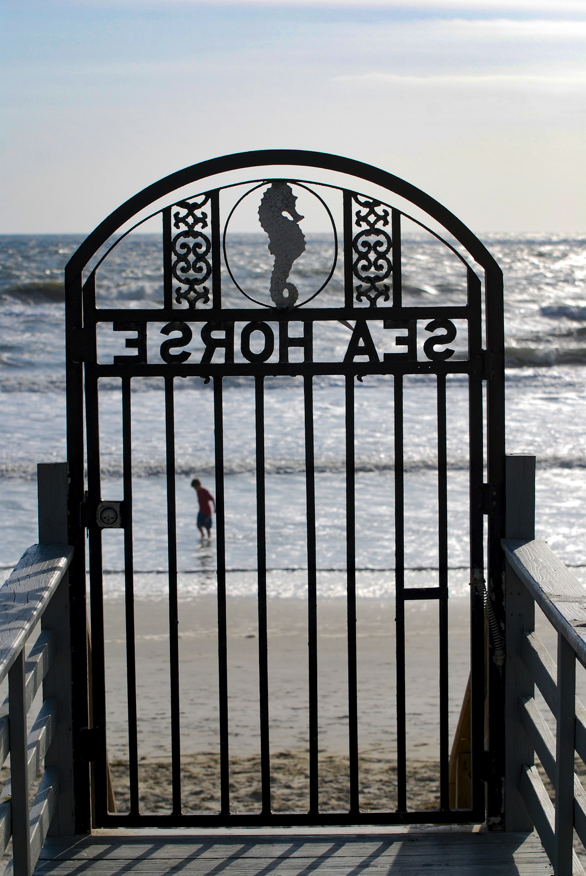 gate to the beach from the sea horse hotel