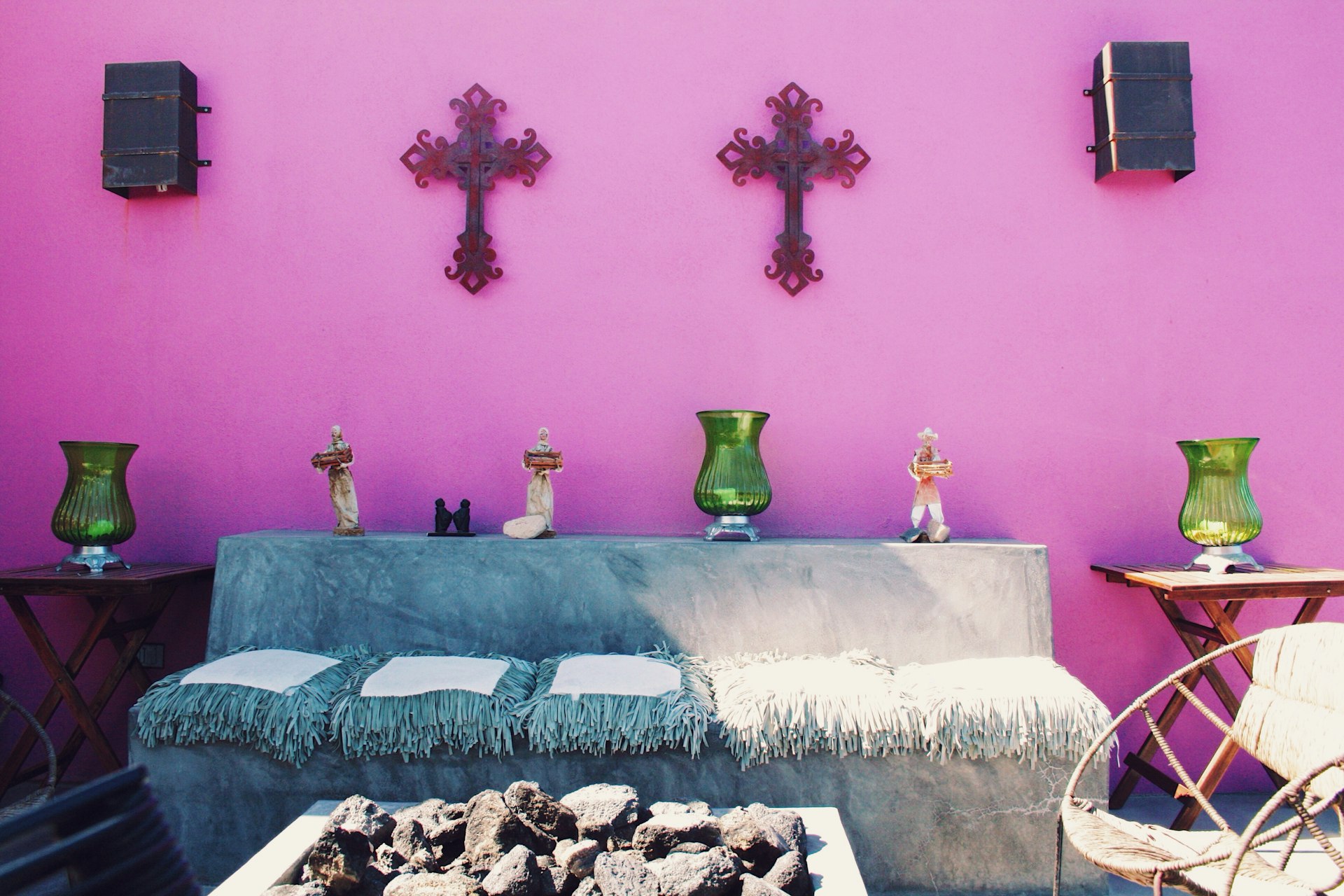 Lounge area and pink wall at El Hotelito in Todos Santos, Baja California Sur, Mexico