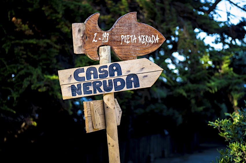 Features - Casa Neruda sign A sign post points the way toward one of Pablo Neruda's homes for those tracing the poet's footsteps © Martin Bernetti / Getty