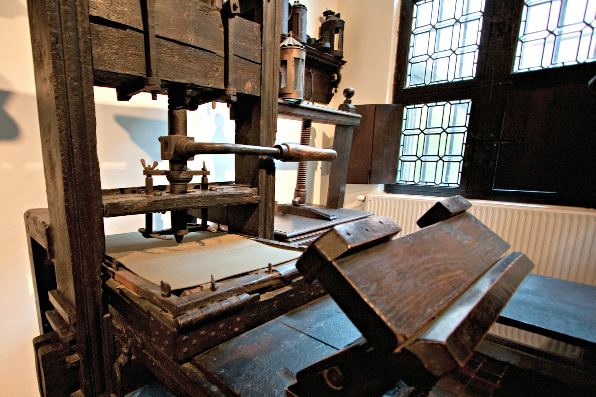 Two of the world's oldest printing presses on display in the printing room of the Plantin-Moretus House-Workshops-Museum, Antwerp, Belgium 