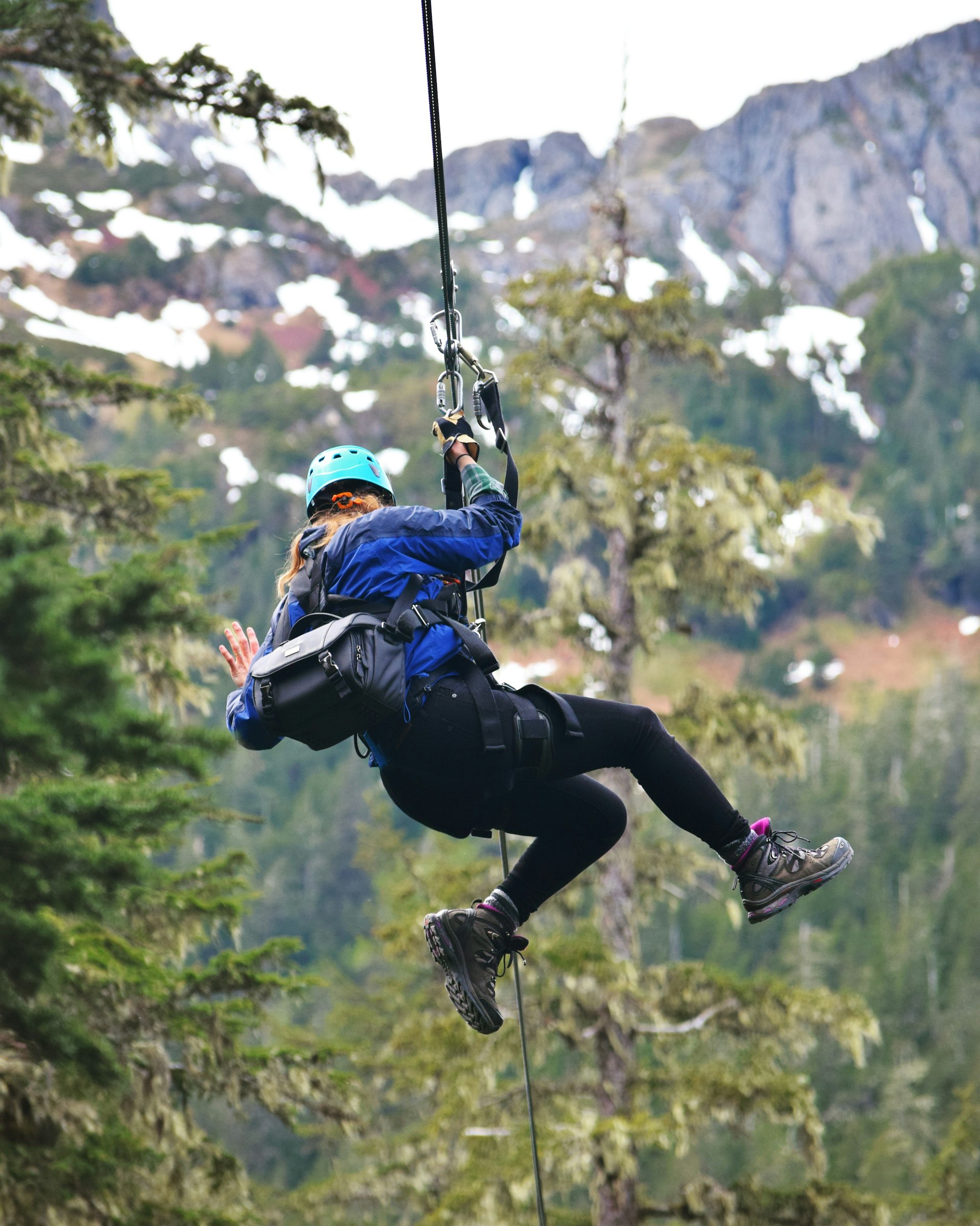 Riding a zipline through a coastal rainforest near Juneau
