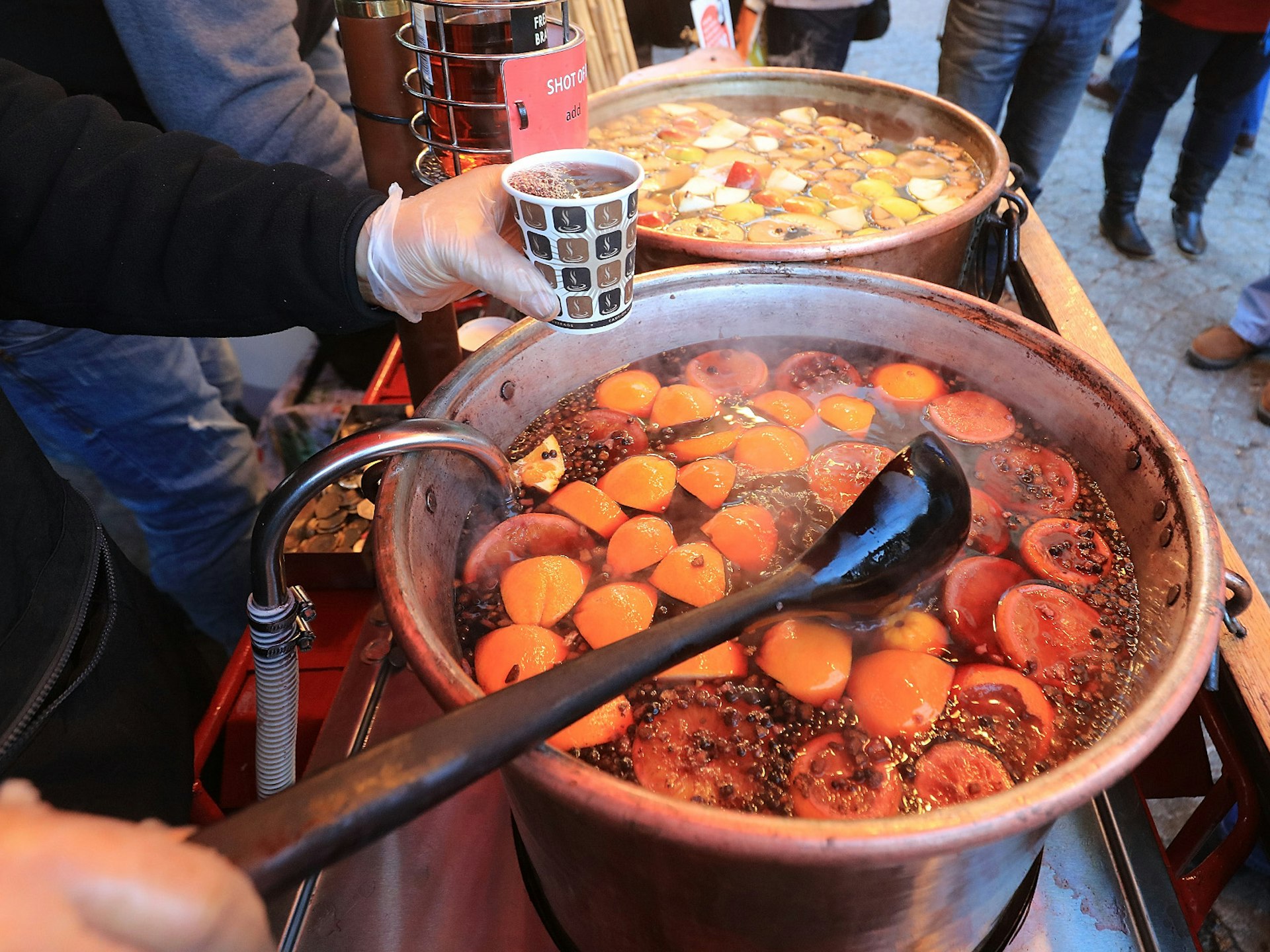 A vat of mulled wine being served up at Bath's Christmas markets