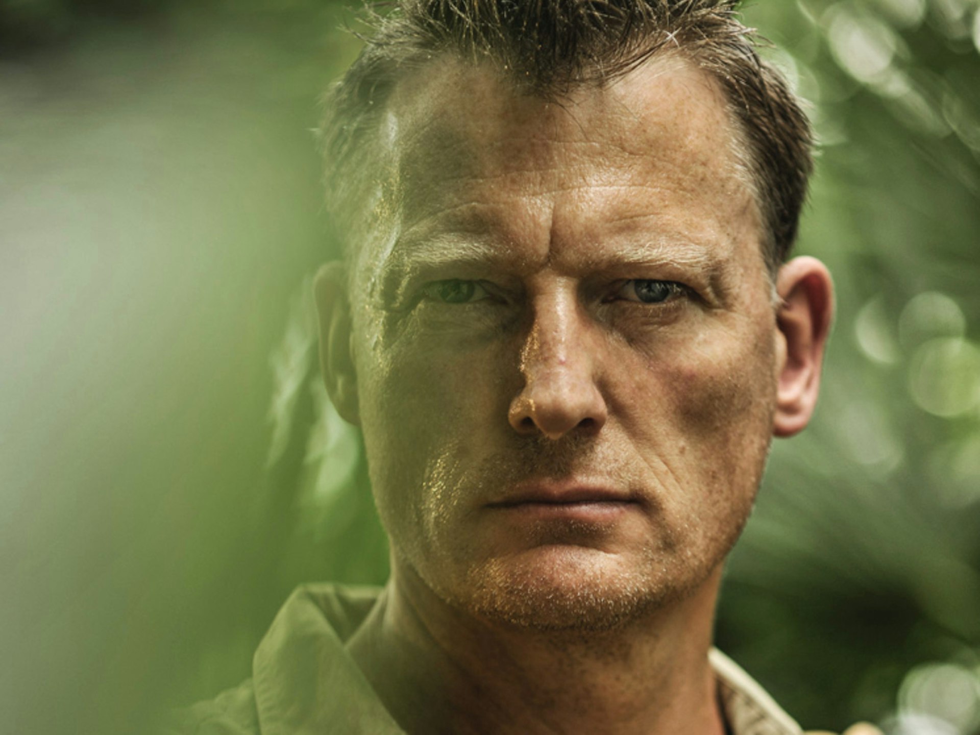 A portrait of adventurer Benedict Allen as though taken in the jungle