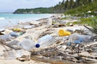 Features - Ocean Dumping - Total pollution on a Tropical beach