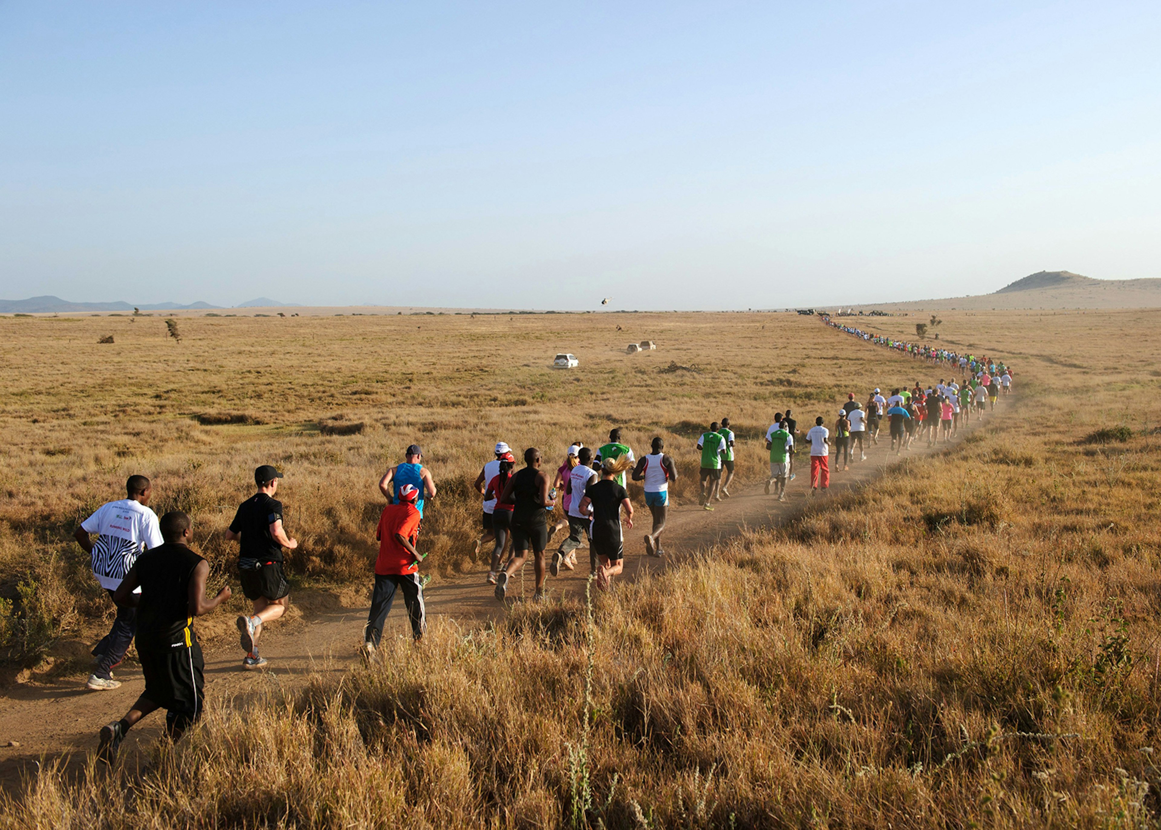Runners competing in the Safaricom Marathon, Kenya © PHIL MOORE / Getty Images