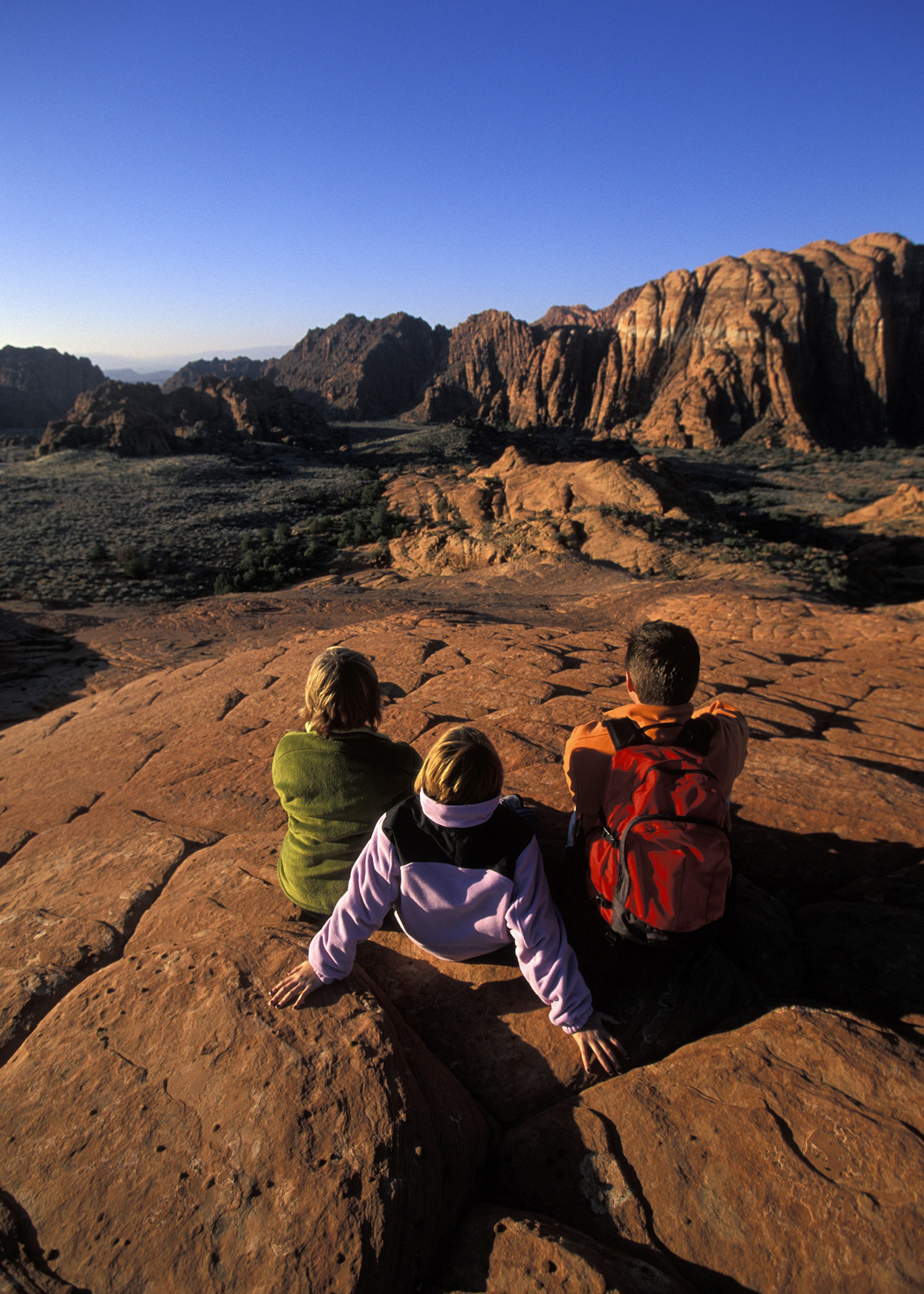 A family enjoying the view after a hike © Corey Rich / Getty Images