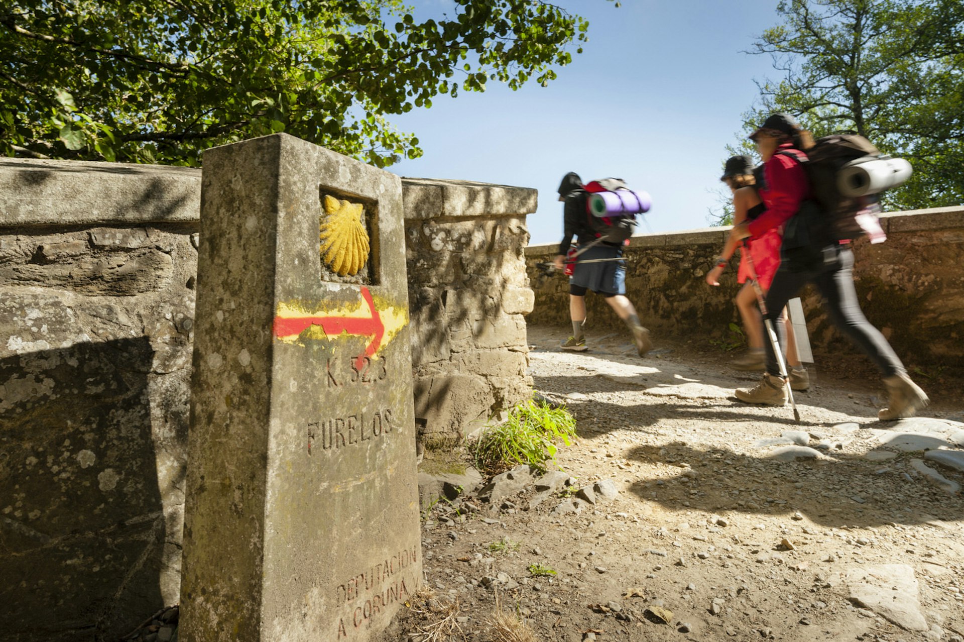 The scallop shell is the symbol of the Camino de Santiago, seen on waymarkers along the route