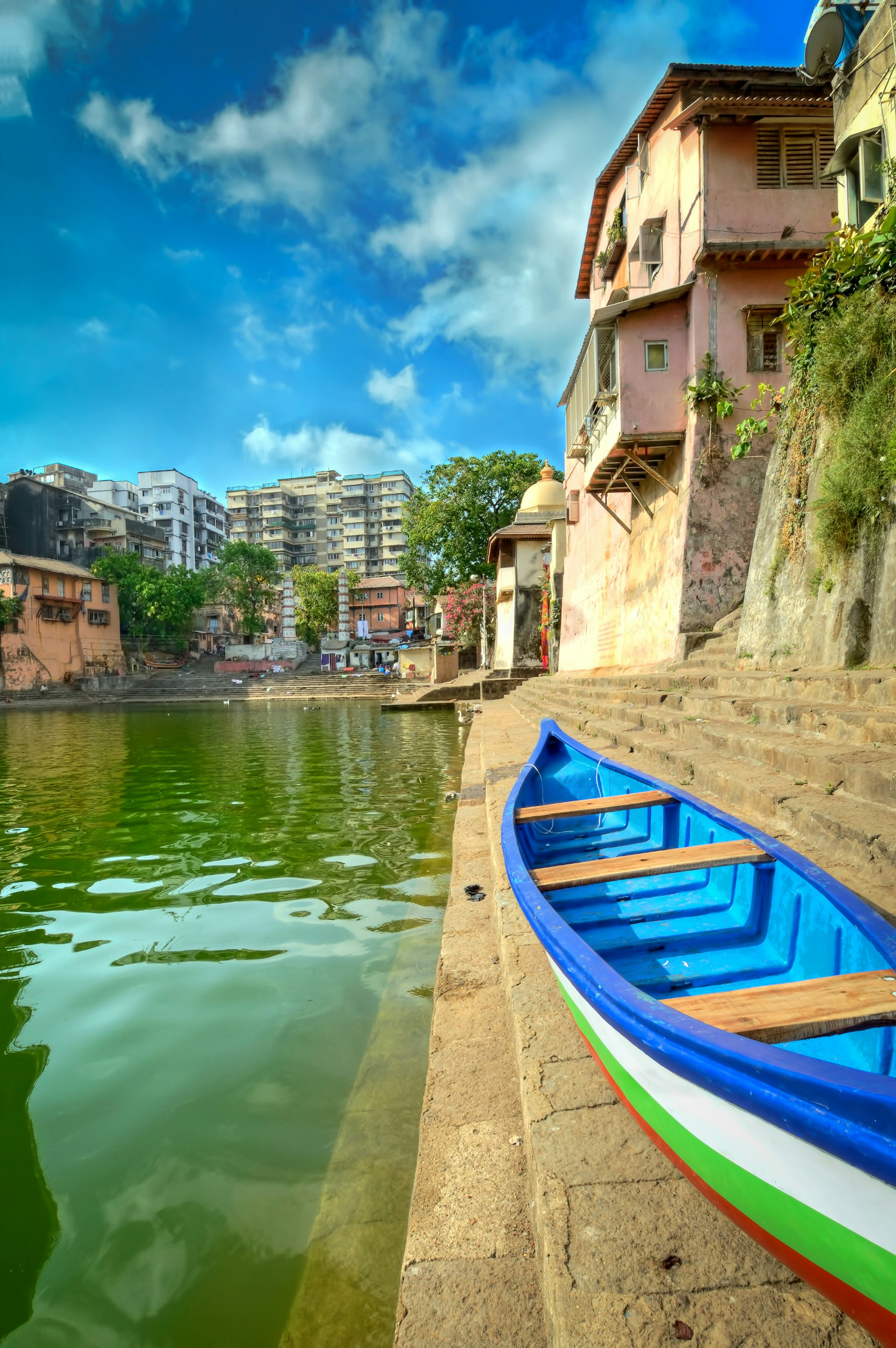 A colourful boat on the banks of the ritzy Malabar Hill district in Mumbai, India
