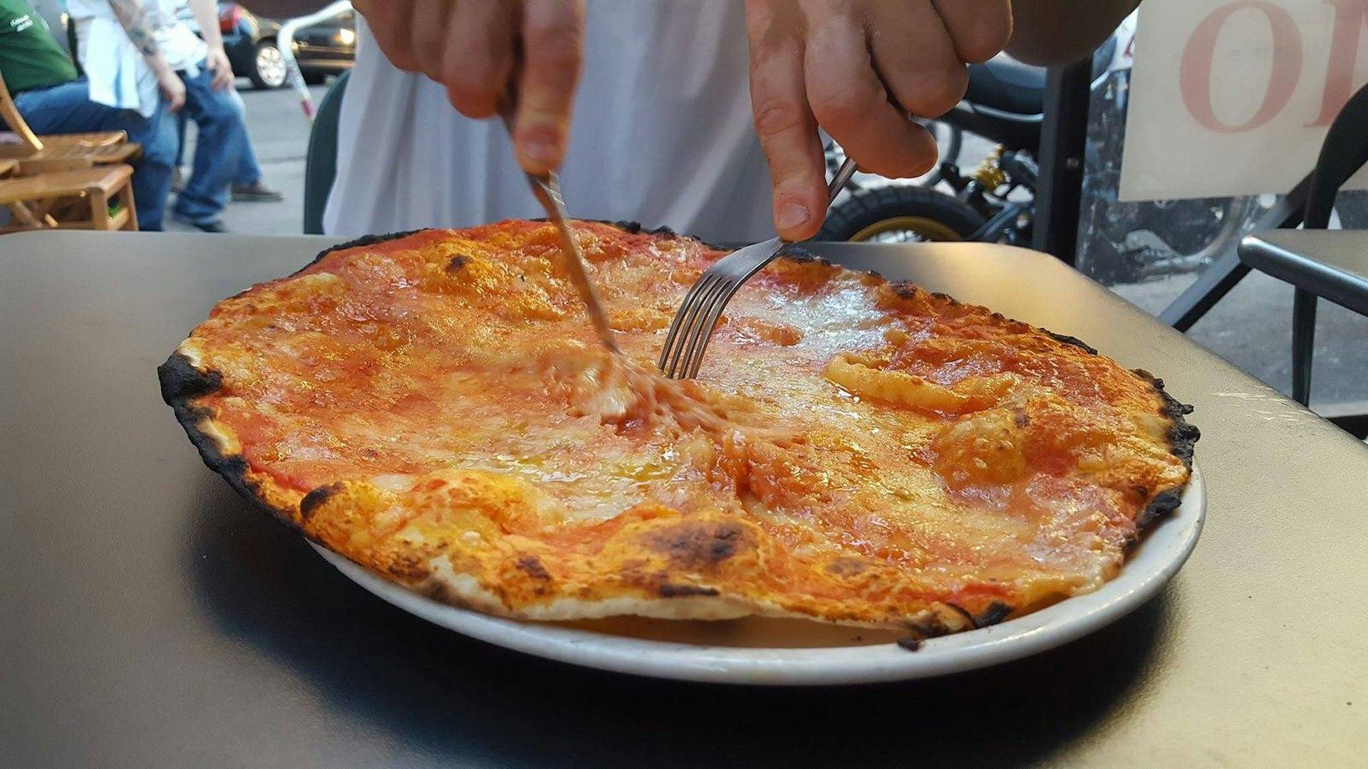 Tucking into a classic Roman pizza at Da Remo 