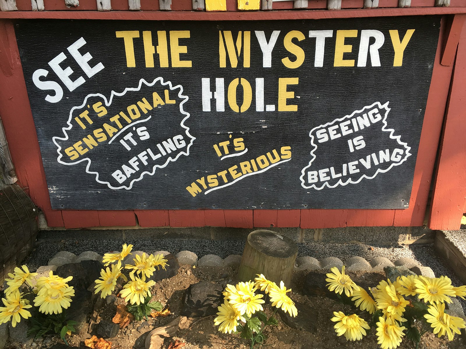 sign for mystery hole in west virginia
