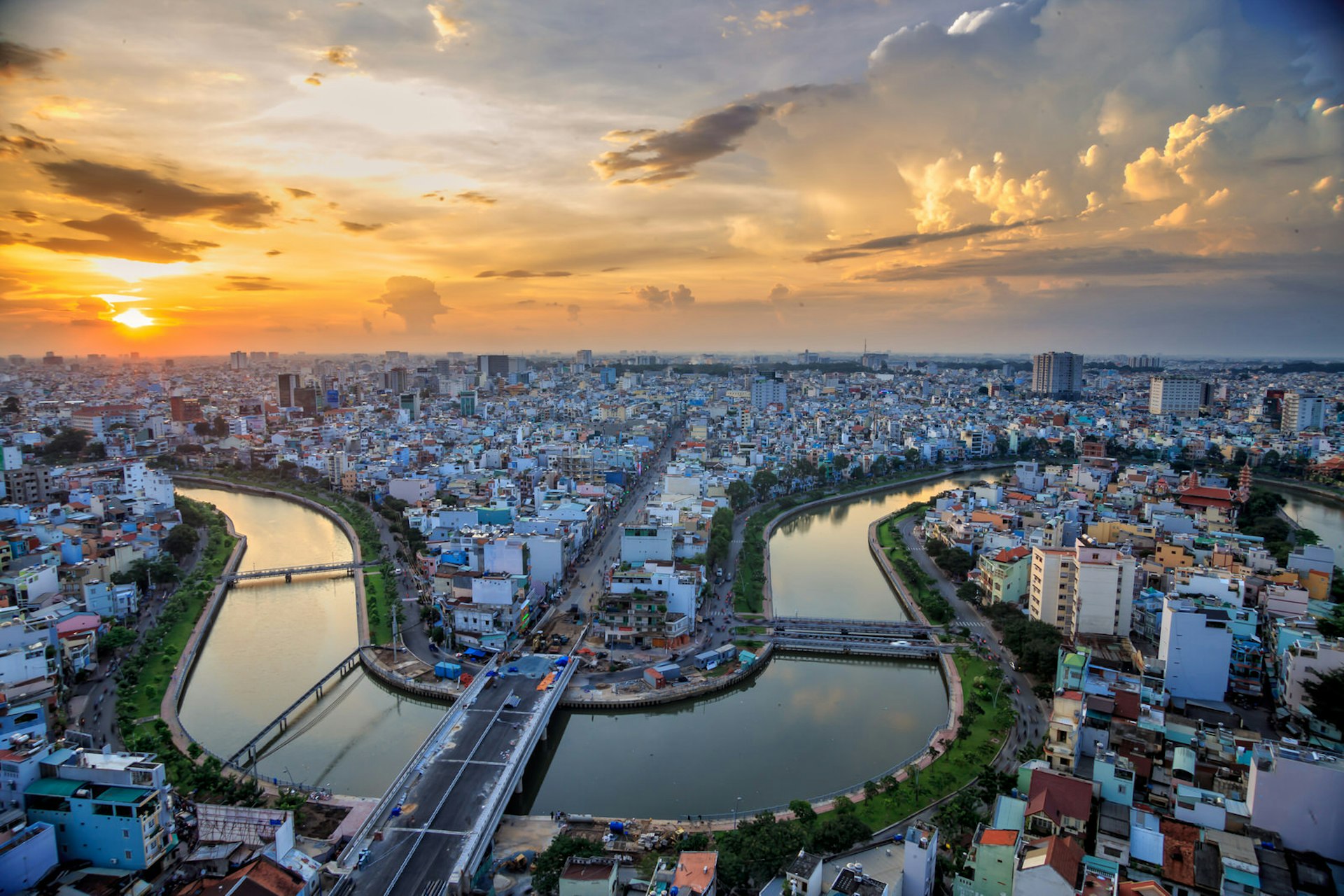 Elevated view of cityscape with river at sunset, Ho Chi Minh city, Vietnam