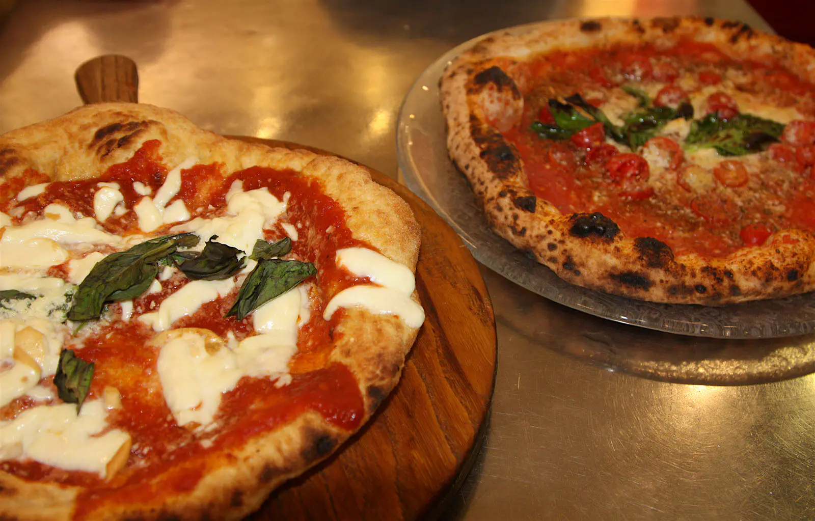 Features - 7_Pizza_Starita-1cd86feeb586 Margherita and Marinara pizza, side by side at Starita © Kristin Melia / Lonely Planet