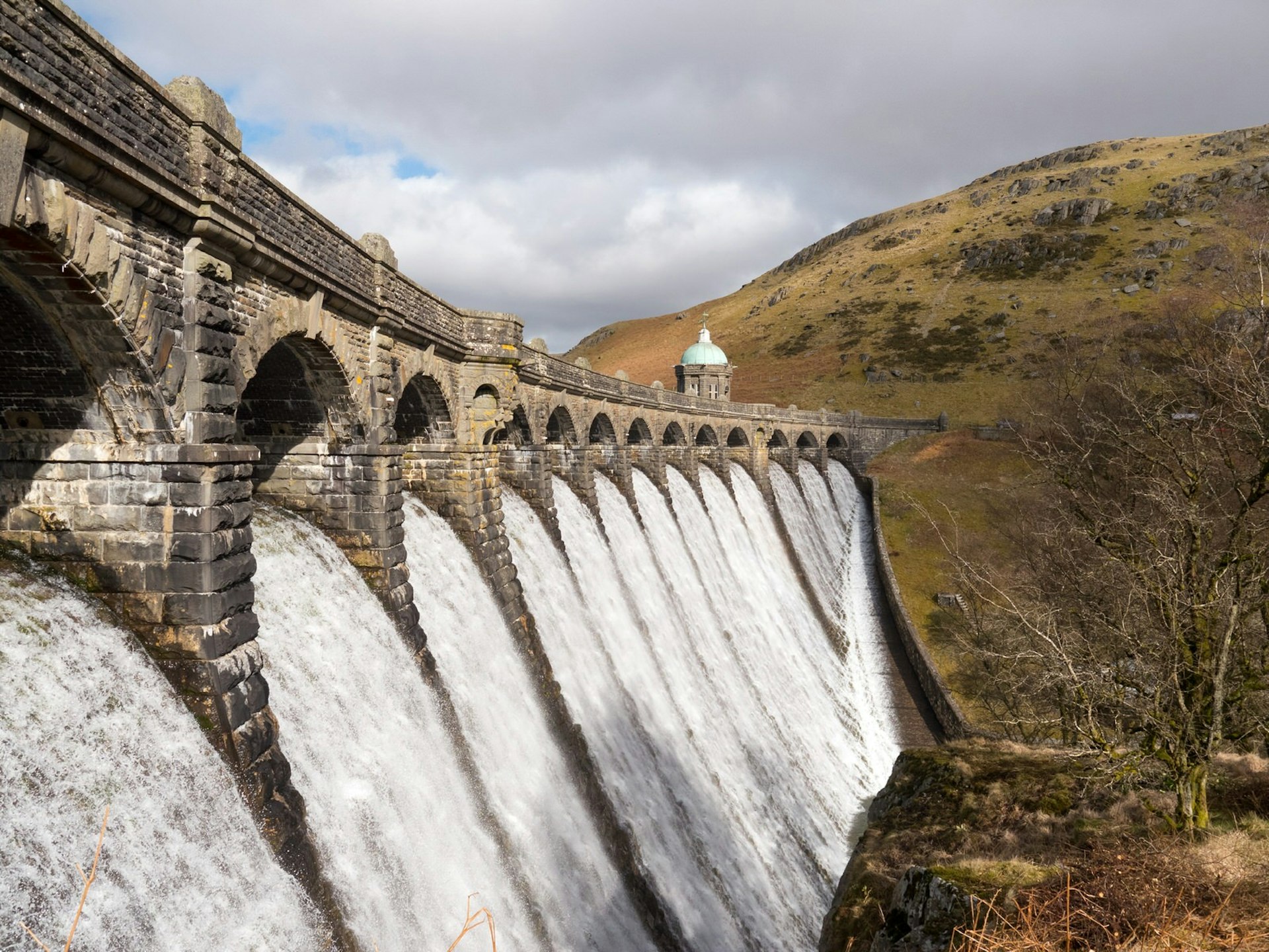 Water cascades down from Craig Goch dam in the Elan Valley, North Wales © Stephen Rees / Lonely Planet