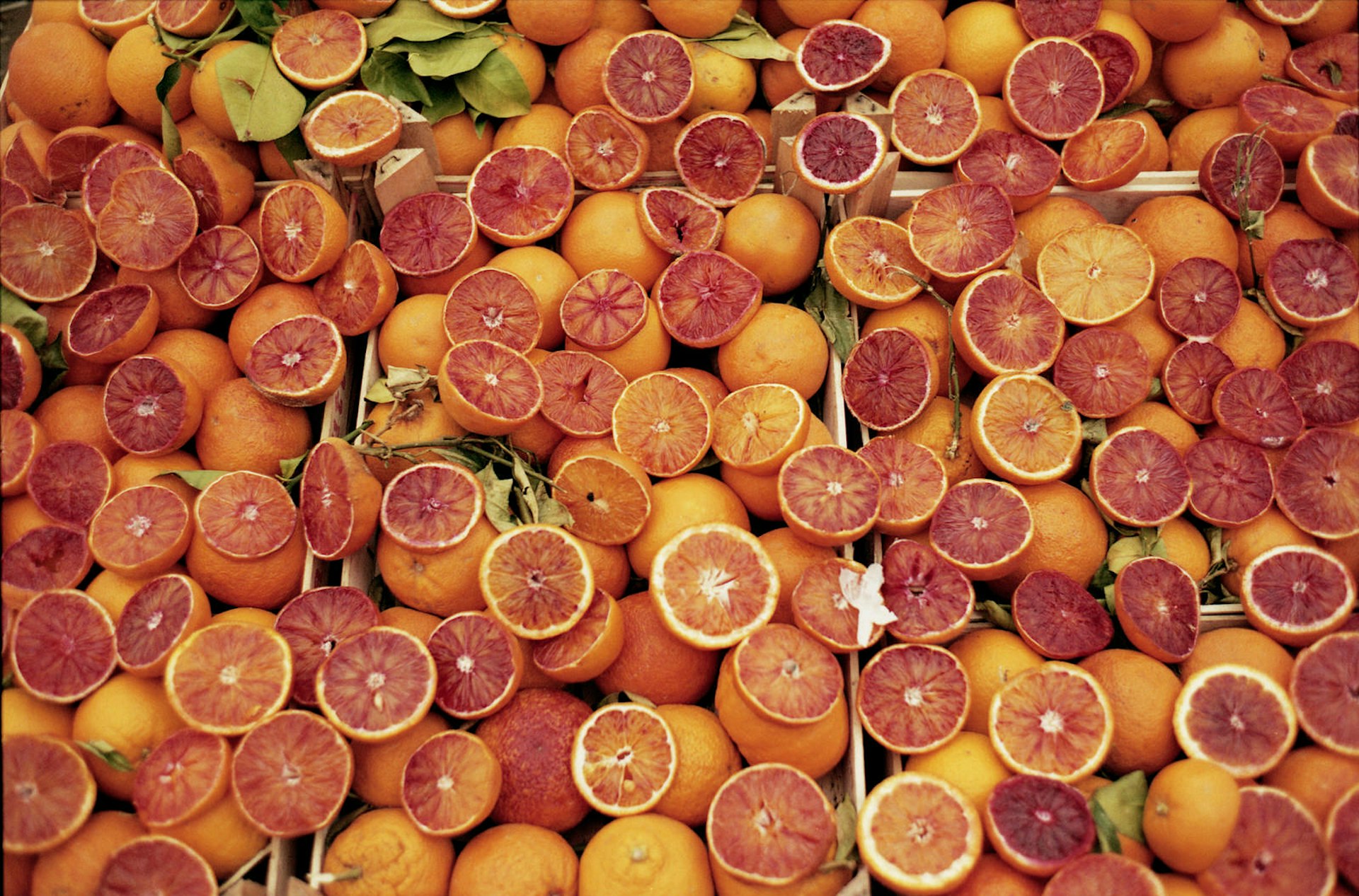 Close up of blood oranges at a market in Sicily.