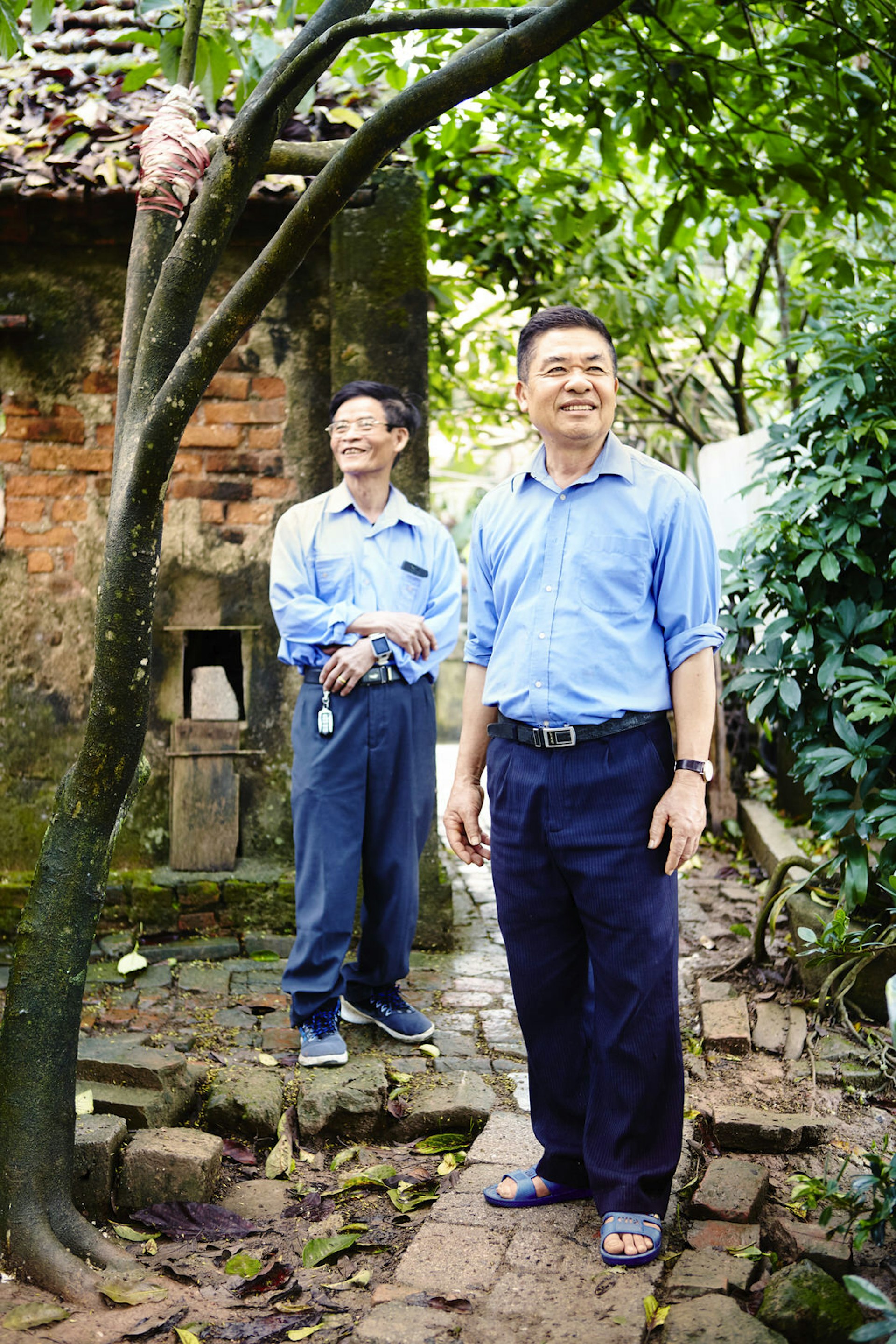 Former railway workers Hoang Van Huan, left, and his friend, Thanh Mai Phan © Matt Munro / Lonely Planet