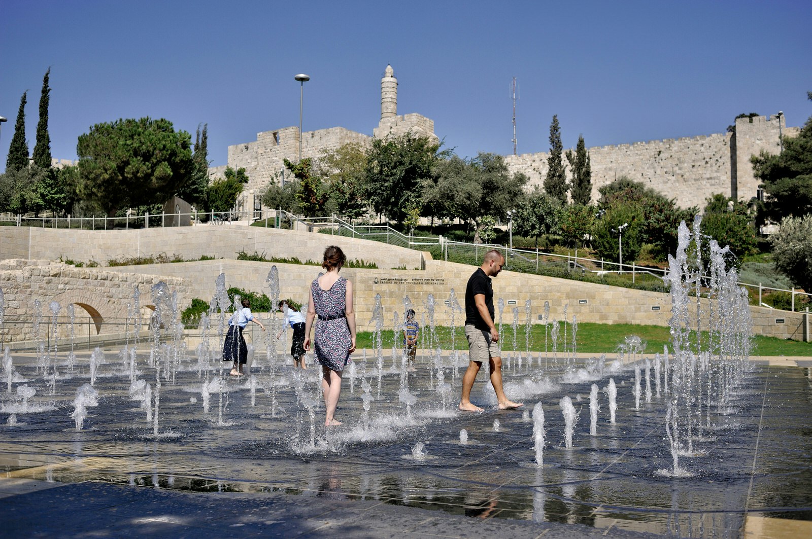 Splashing in the water playgrounds in Jerusalem. Image by Jan Hon / Lonely Planet