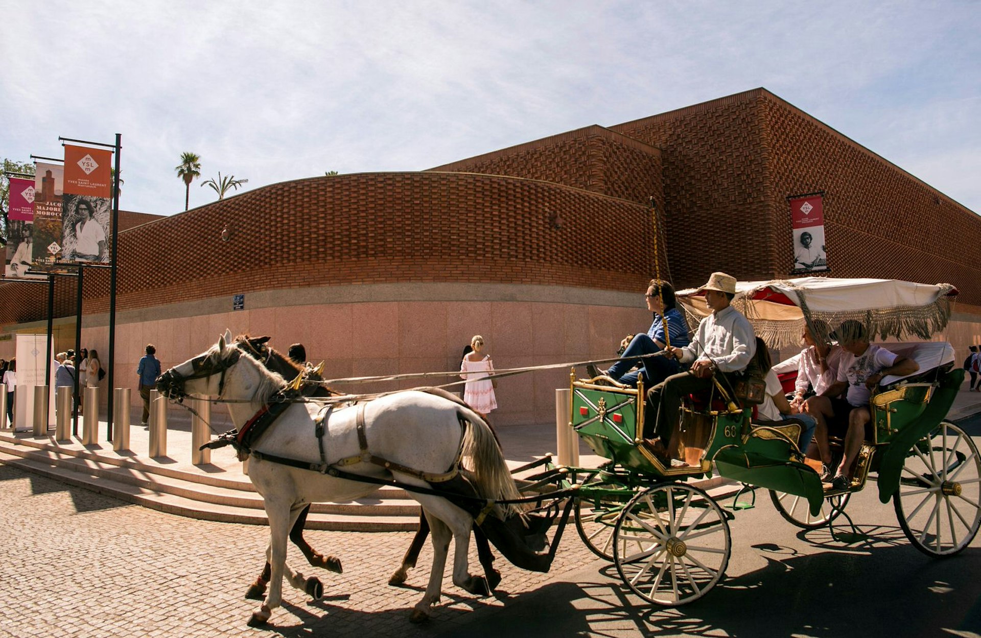 Tourists arrive to visit the new Yves Saint Laurent museum in Marrakesh, Morocco