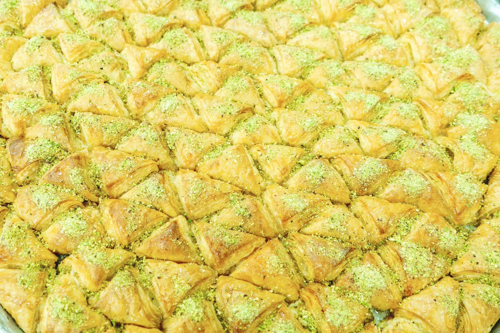 Freshly made baklava at the Nafeeseh bakery is a welcome sight. Image by Yulia Denisyuk / Lonely Planet