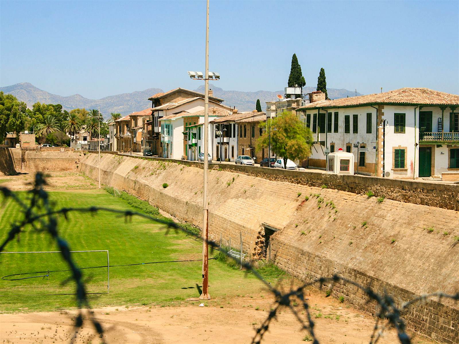 Features - Nicosia-barbed wire The Turkish side of the Cypriot capital seen through a barbed-wire fence © DPimenov / Shutterstock