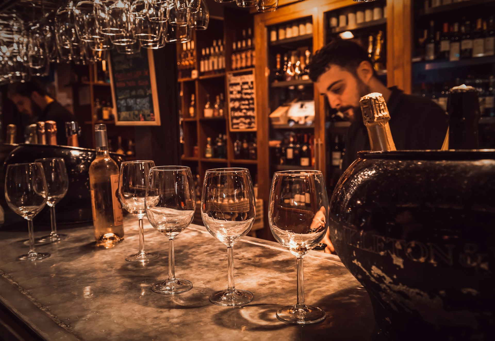 Wine glasses lined up in a Madrid bar © Catarina Belova / Shutterstock