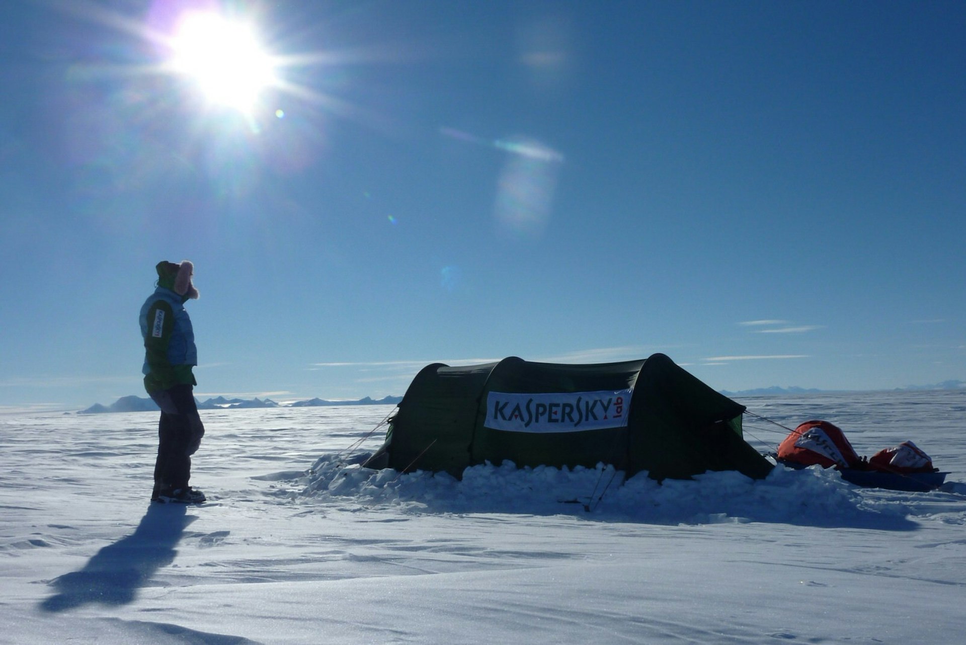 Felicity Aston poses by her tent in Antarctica