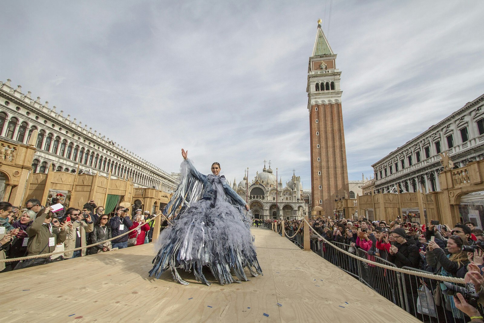 Huge crowds flock to watch the Flight of the Angel in Piazzo San Marco.