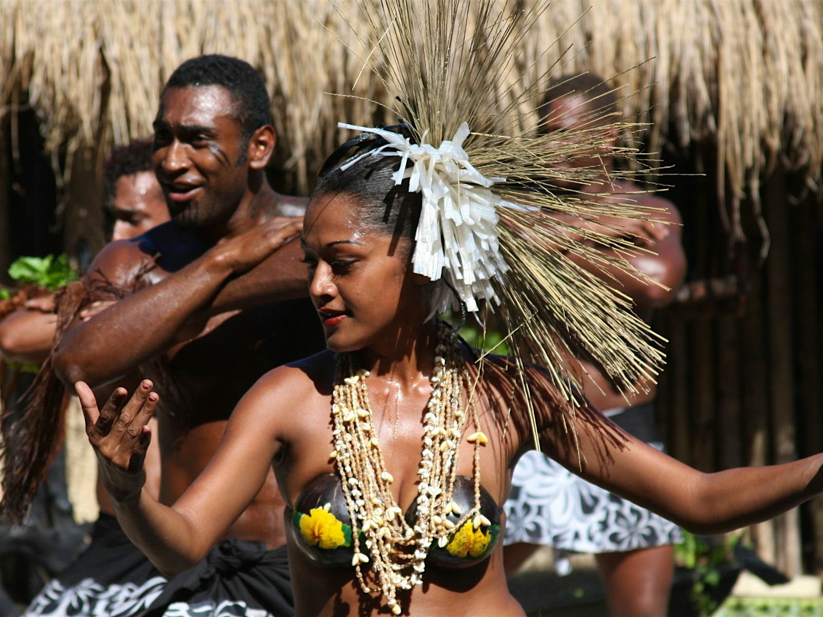 Features - Fiji_dancing-f7f21b9c6ea3 A group performs a traditional Fijian dance