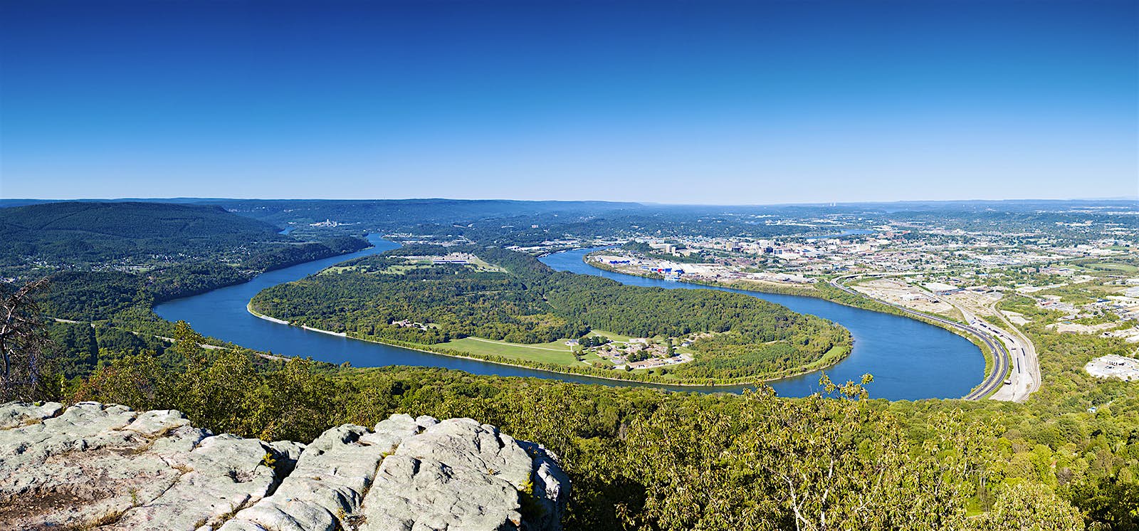 Features - Tennessee River Panorama From Chattanooga Aerial view of the blue Tennessee River curves around Moccasin Bend and past Chattanooga