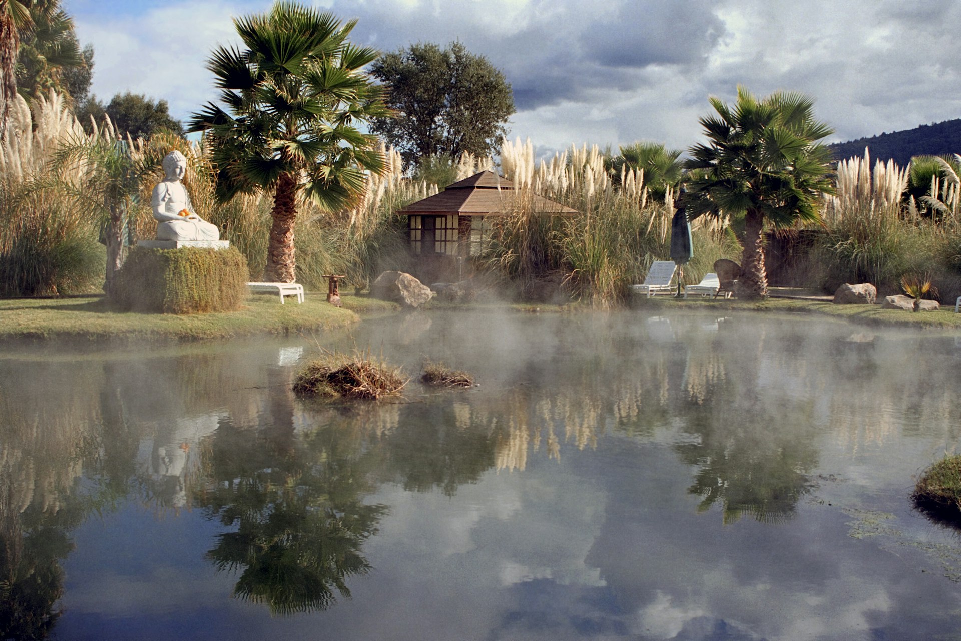 Steam rises off the thermal hot spring pool at Indian Springs in Calistoga, California