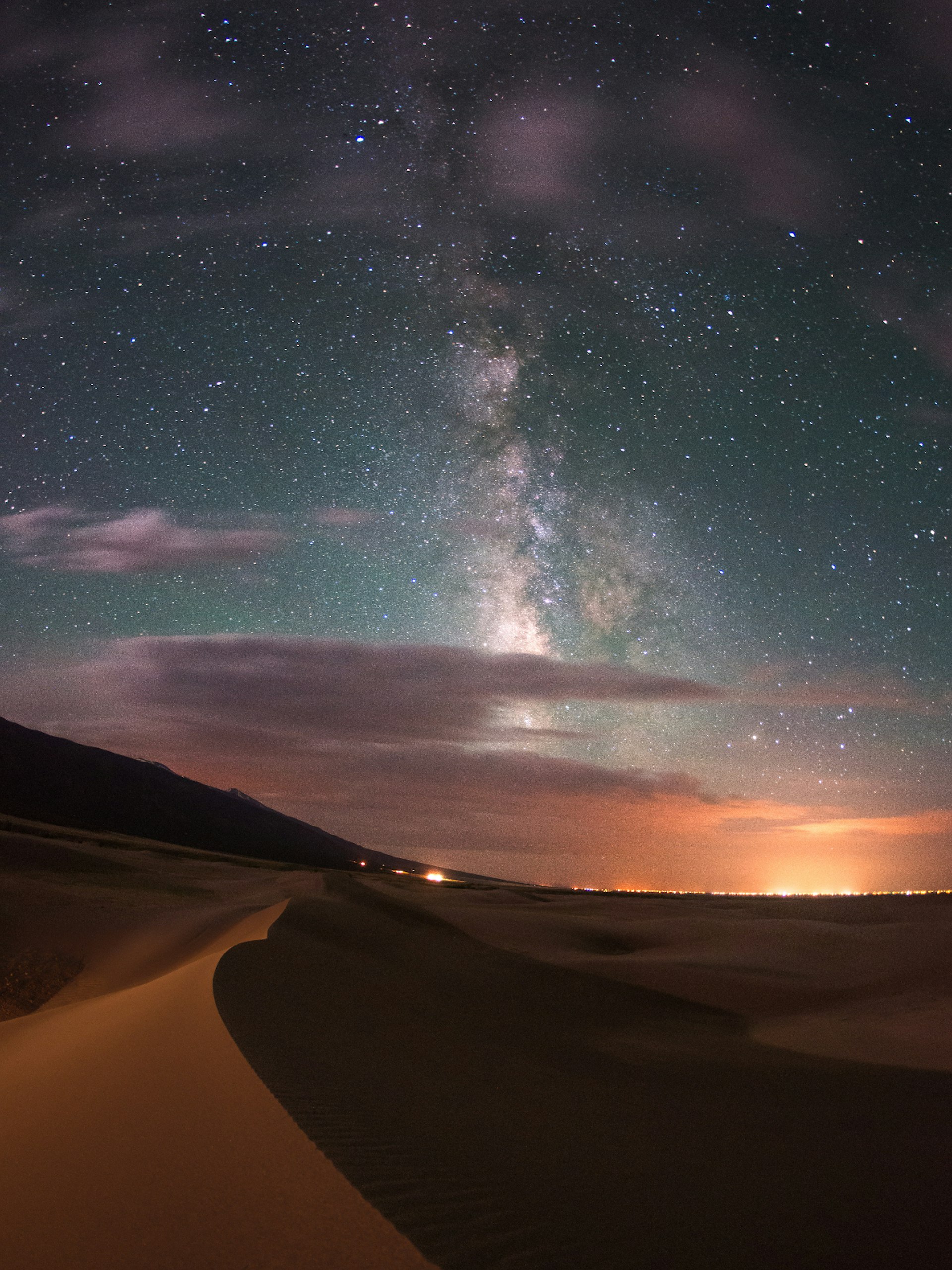 Sand dunes with the Milky Way and stars above; Stargazing Southwest USA