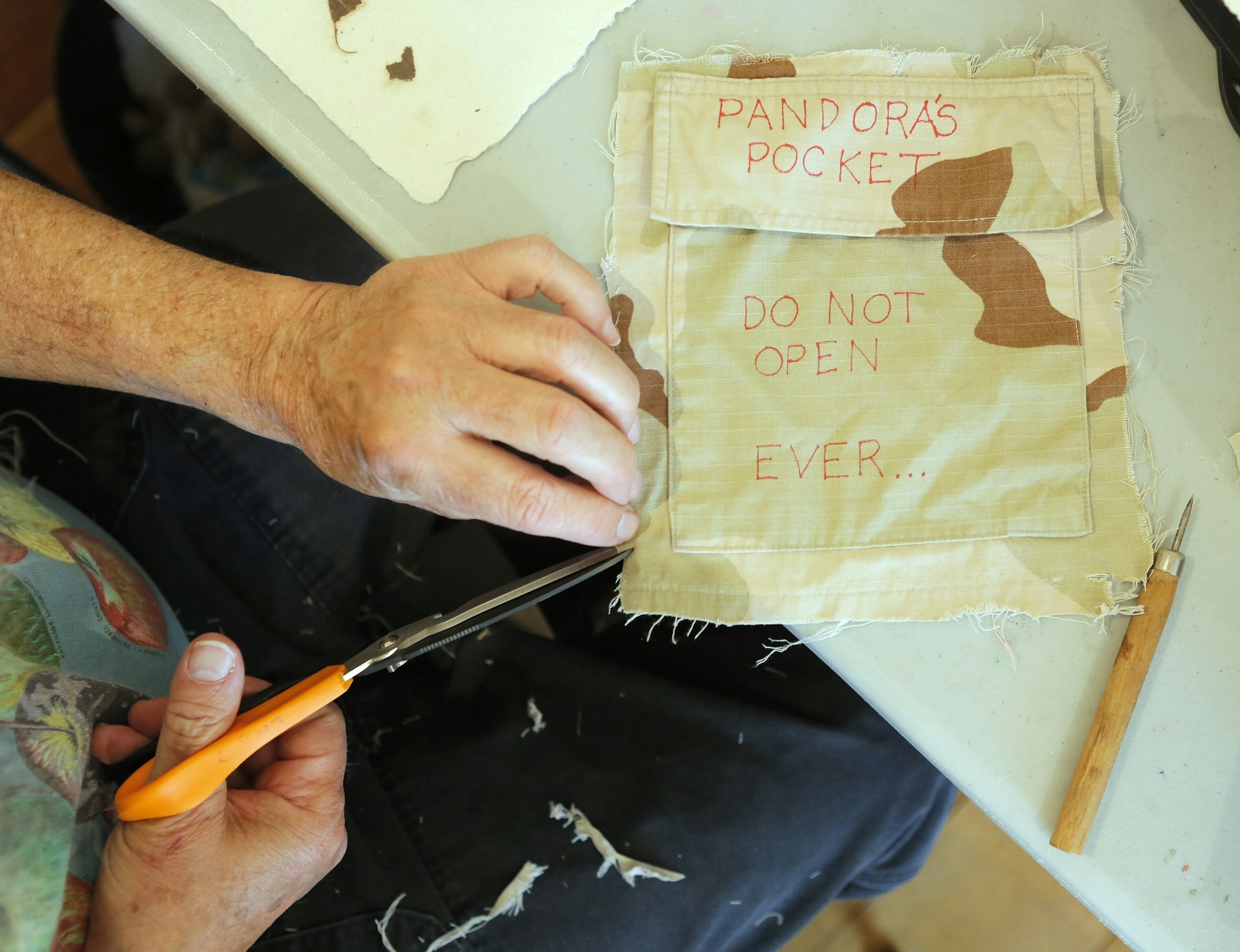 Features - Veterans make art on paper made from uniforms