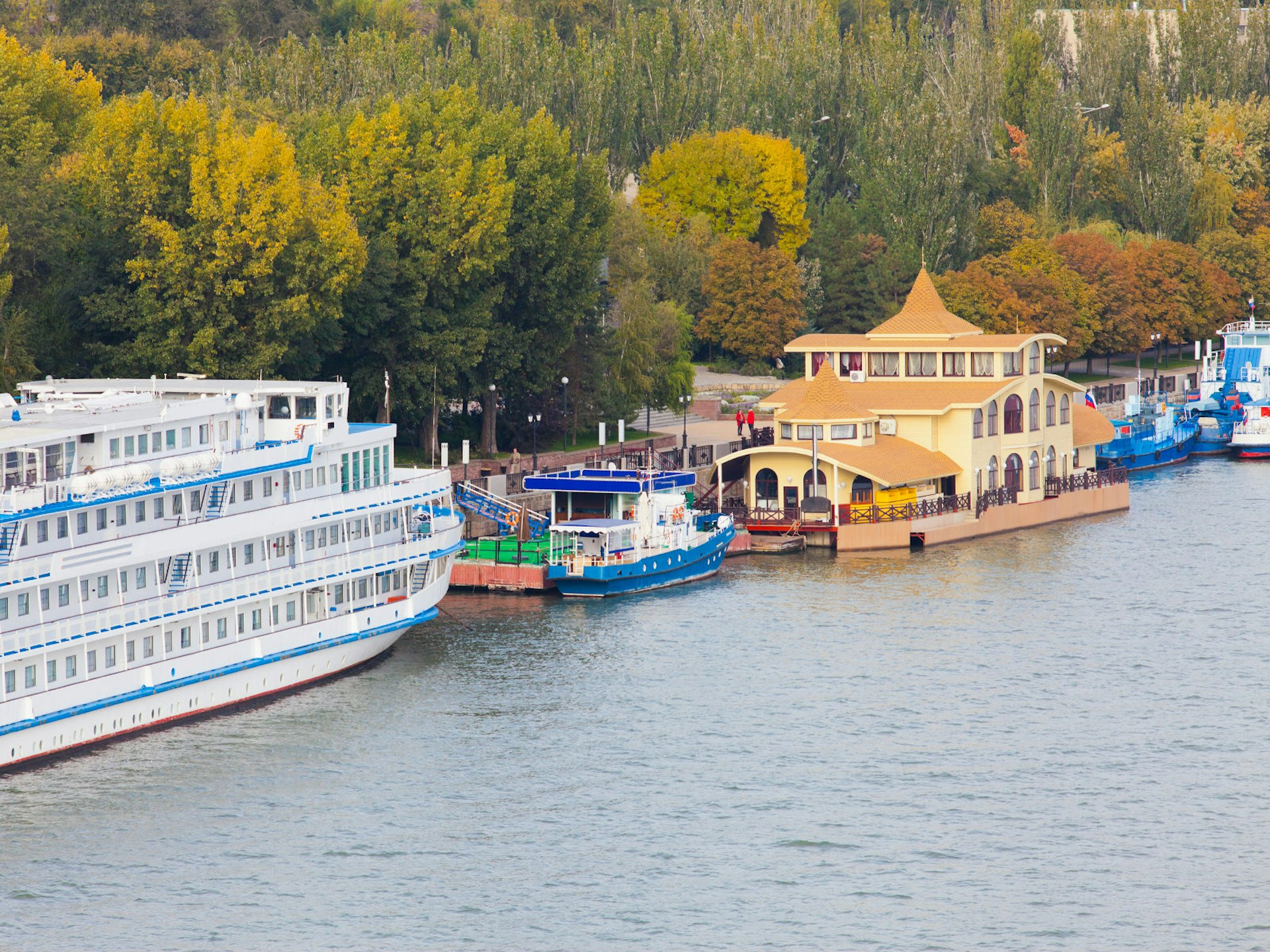 A cruise ship joins smaller boats on the Don River near the port at Rostov-on-Don © Pavel Ilyukhin / Shutterstock