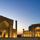Samarkand's Registan Square at dusk © Megan Eaves / Lonely Planet