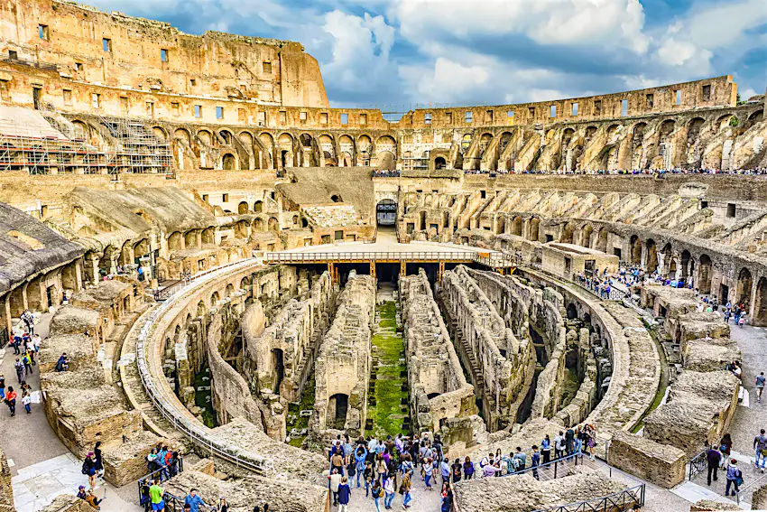 Colosseum in Rome, Italy Interior of Rome's Colosseum with a crowd of tourists