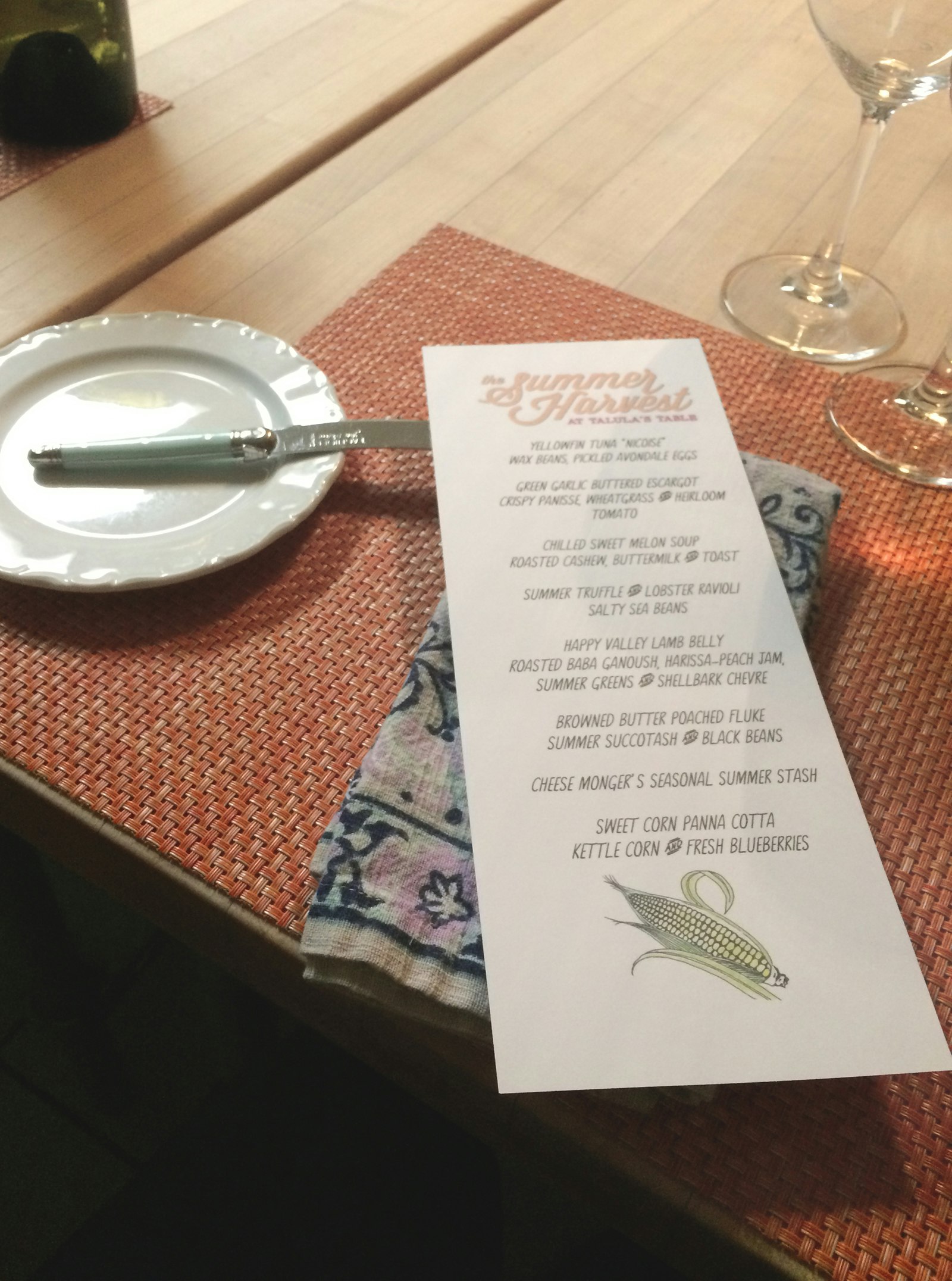 a menu lies across an orange placemat at Talula's Table in Chester County