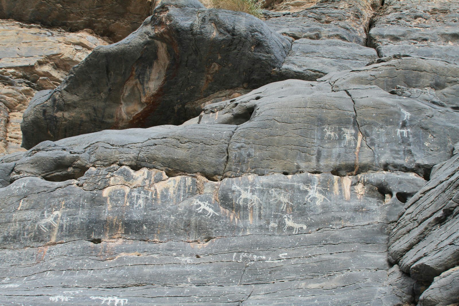 Petroglyphs are etched into the walls of Wadi Bani Kharus. Image by Jenny Walker / Lonely Planet