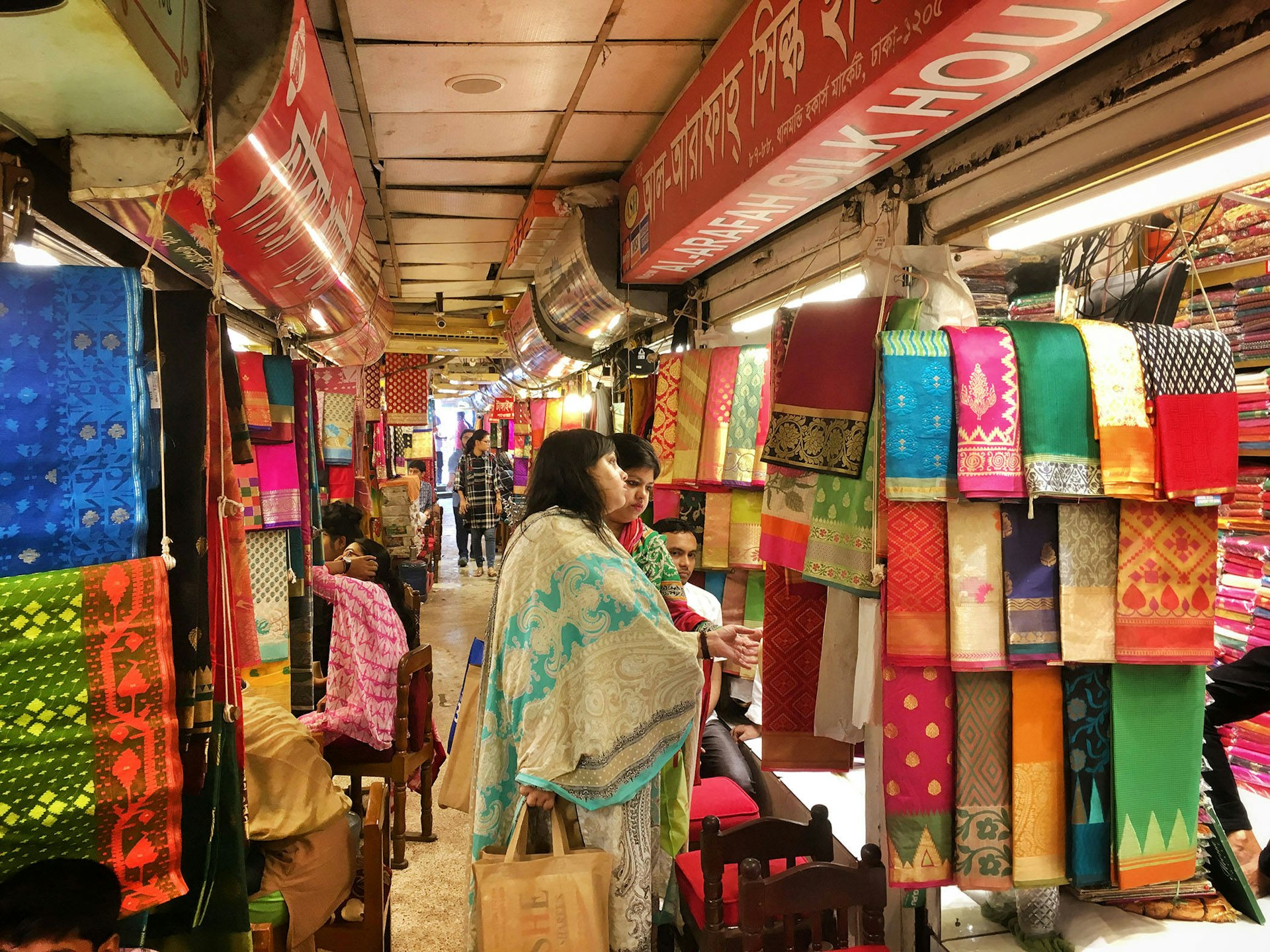 Rainbow saris for sale in Dhanmodi Hawkers' Market