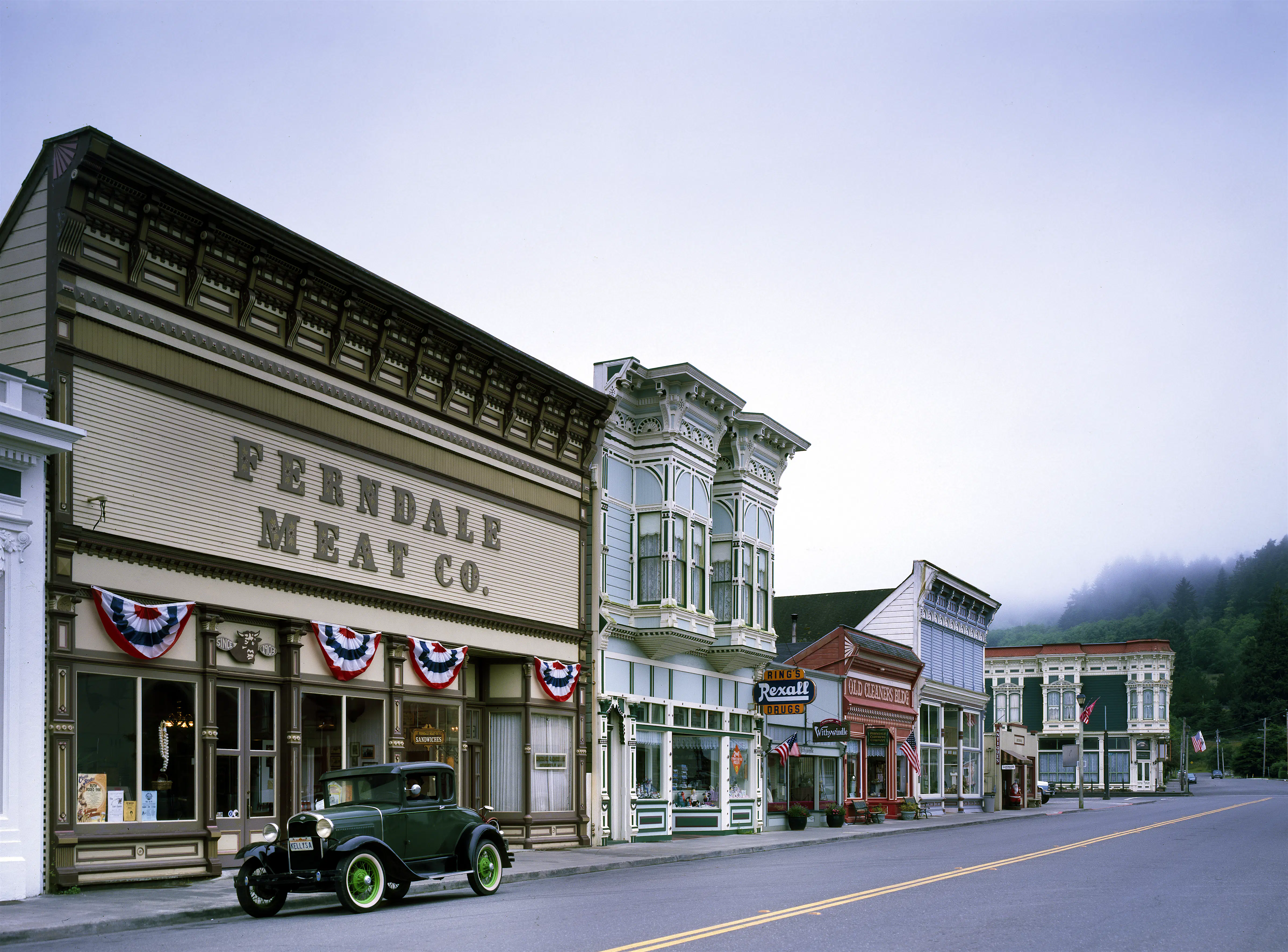 Features - An antique car fits perfectly in Ferndale, California, a Victorian town and old dairying center An antique truck looks right at home parked in front of the western facade of the Ferndale Meat Co.