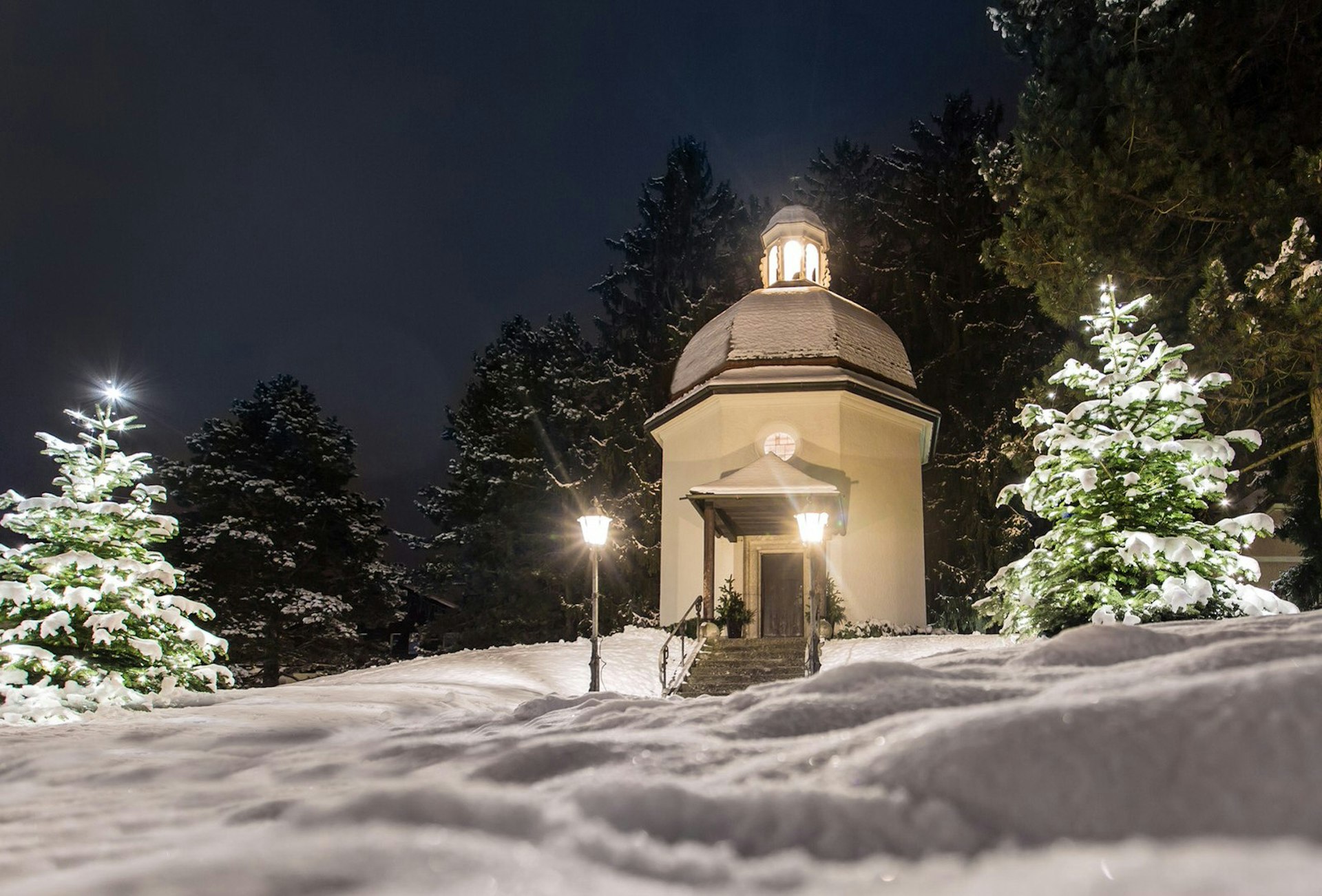 The small Silent Night Chapel in Oberndorf bei Salzburg surrounded by snow 
