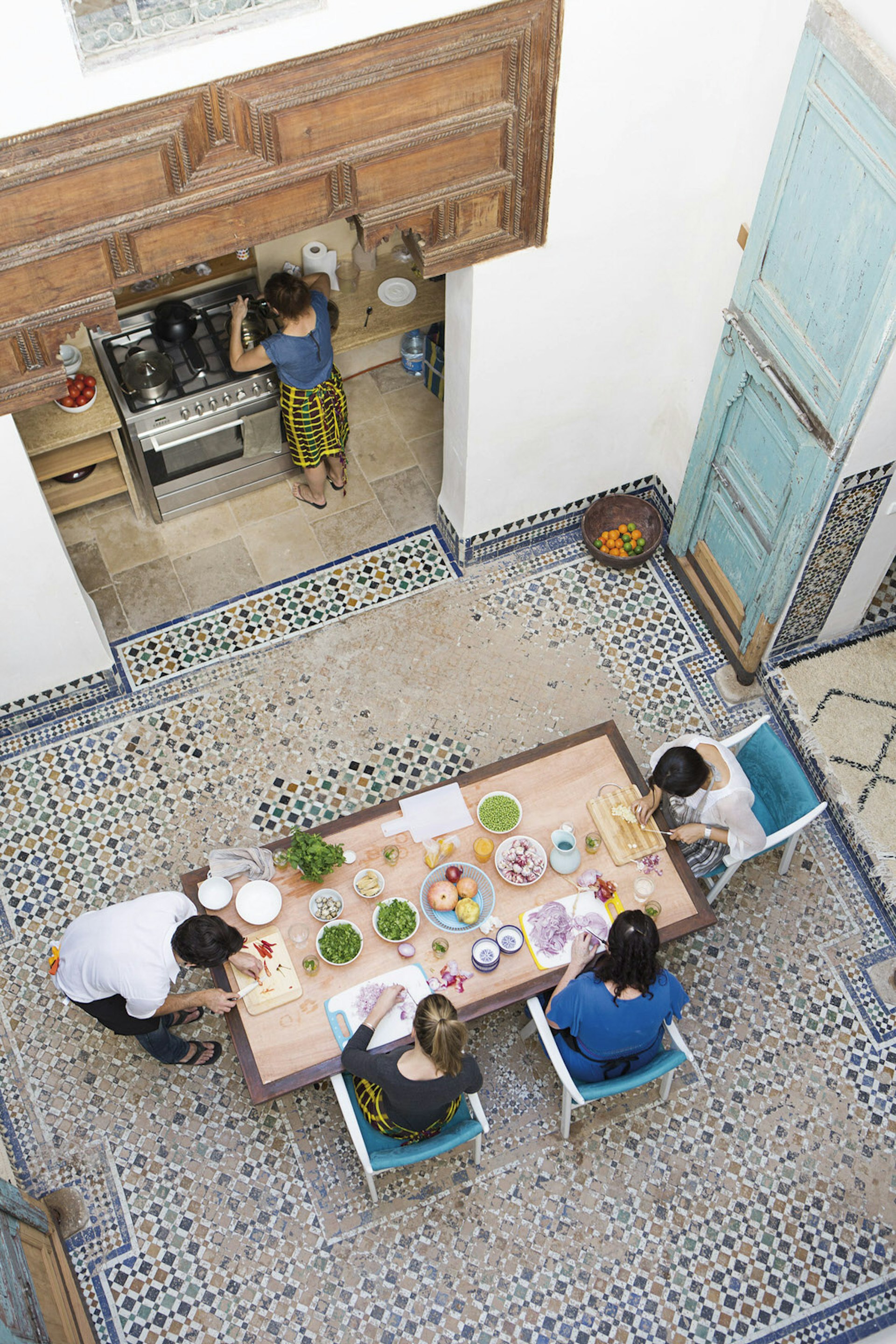 Cooking class in progress at The Courtyard Kitchen. Image by The Courtyard Kitchen
