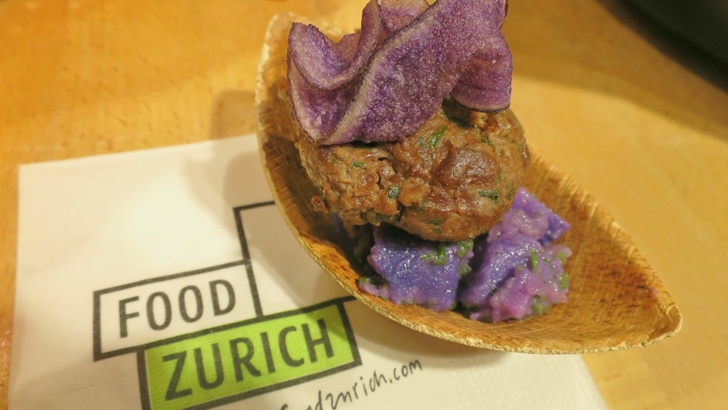 Meatballs and blue potatoes at the Food Zürich food festival in Switzerland