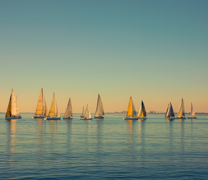 Sailboats scattered on the ocean, seen from The Pier in Geelong, Australia