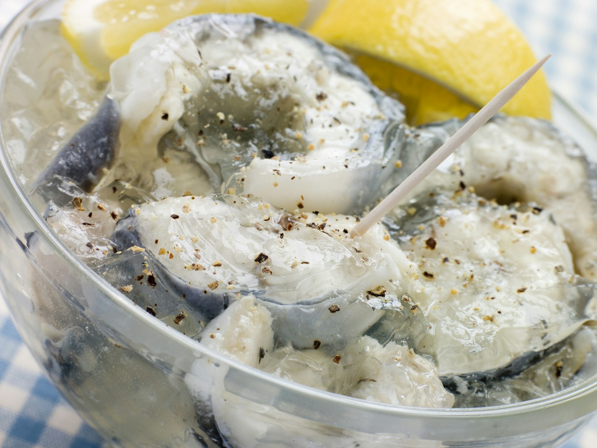 An up-close perspective of a bowl of jellied eels