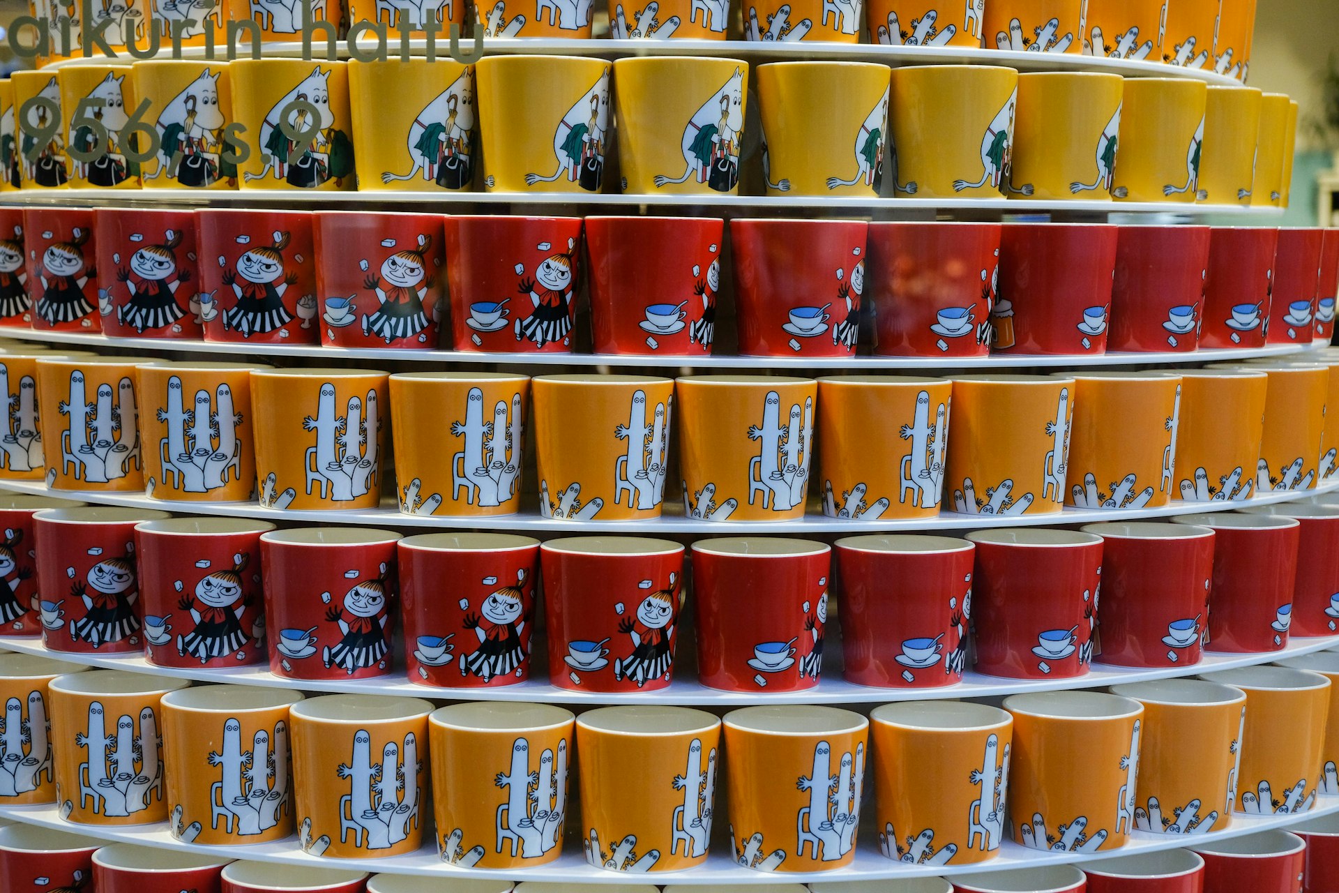A display of Moomin–print mugs, layered in tiers © Tim Bird / Lonely Planet