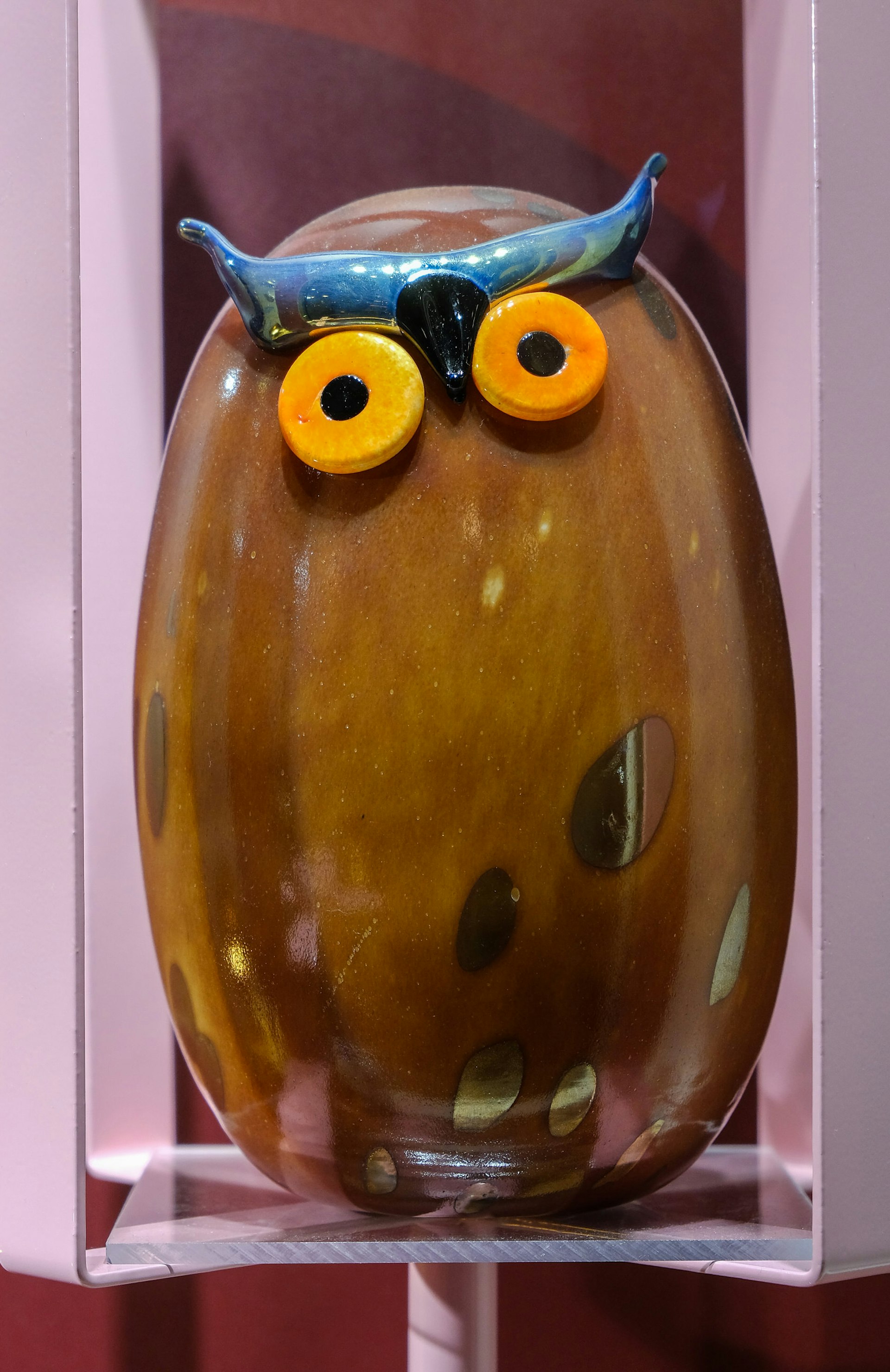 Close-up of a stylised glass ornament of an owl © Tim Bird / Lonely Planet