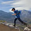 Features - "Boy jumping boulders in Andes, Valparaiso, Chile"