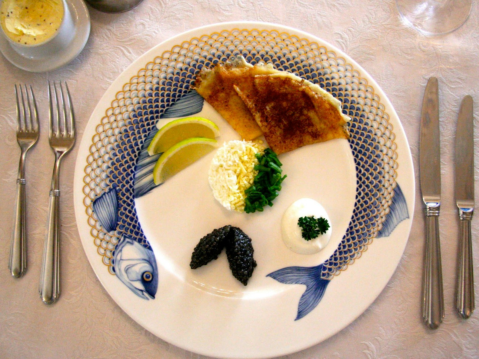 Bliny (pancakes) are typically served with toppings that include varieties of caviar © Simon Richmond / Lonely Planet