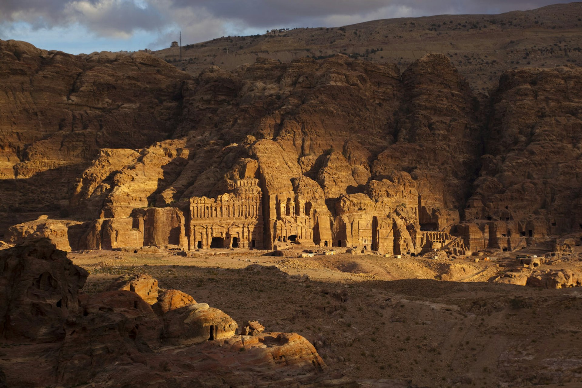Sunset over the Royal Tombs in Petra, Jordan. Image by Ethan Welty / Getty Images