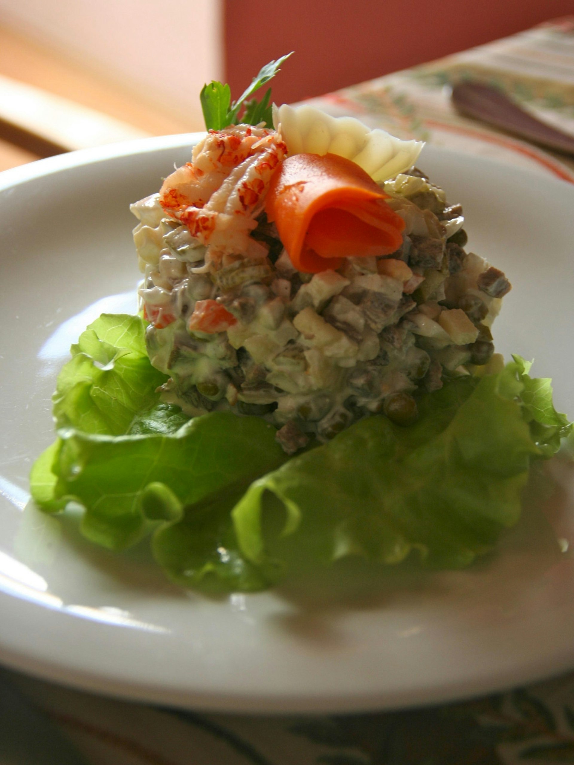 Salat Olivye (Olivier salad) is one of the most popular recipes on Russian restaurant menus © Simon Richmond / Lonely Planet
