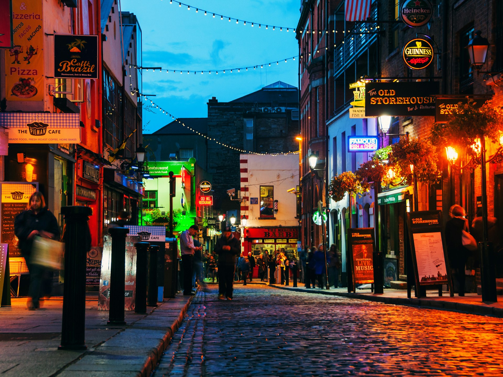 Dublin after dark: a view of the pubs and bars down a street of the Temple Bar area in Dublin